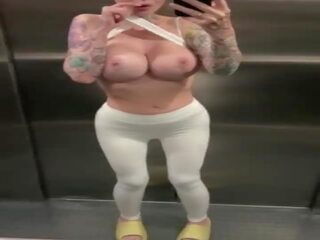 Bald prostitute squirting orgasm in public elevator